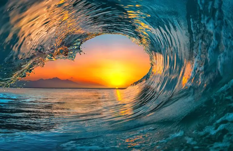 View of Sunset Sunrise Through Sea Water Ocean Waves