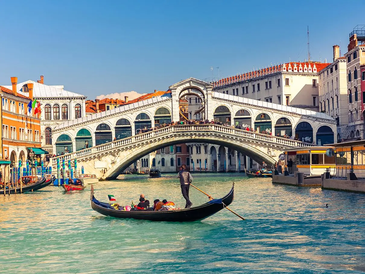 Rialto Bridge in Venice with Gondola Water Taxi